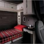 Simples fato de motorista de caminhão dormir na cabine do veículo não gera dano moral